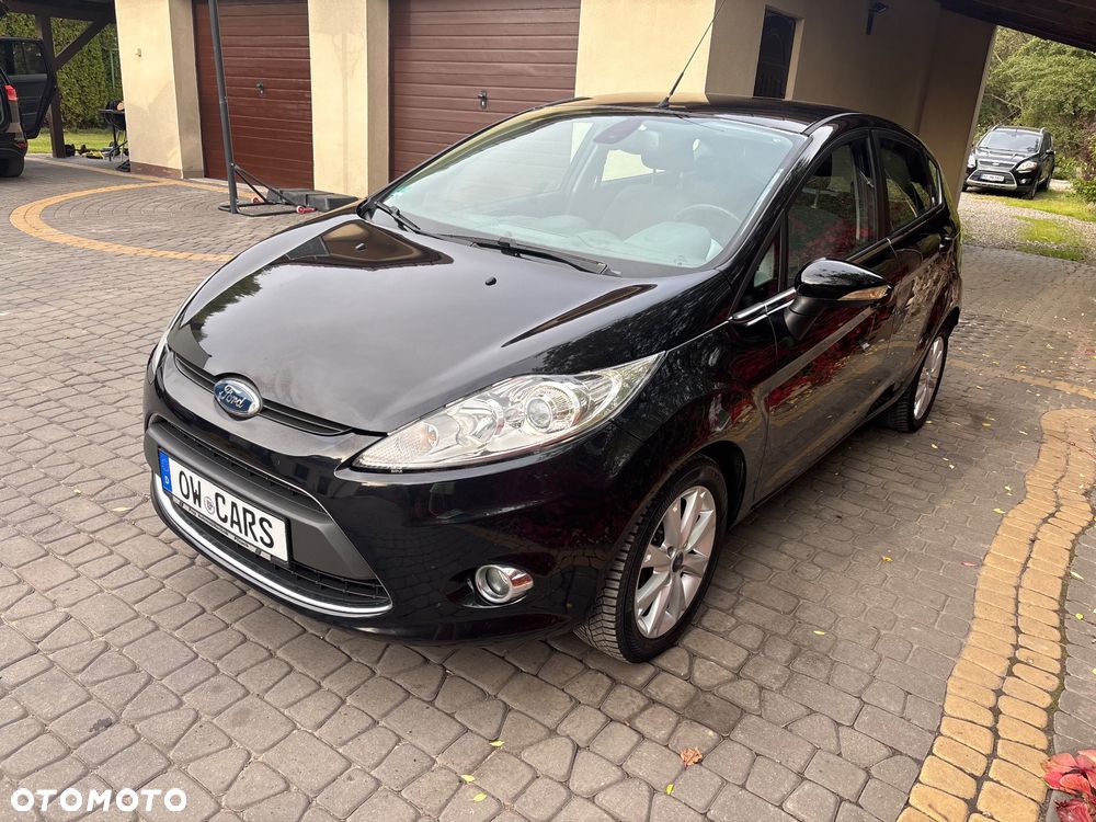 Ford Fiesta 1.4 Ghia - 10