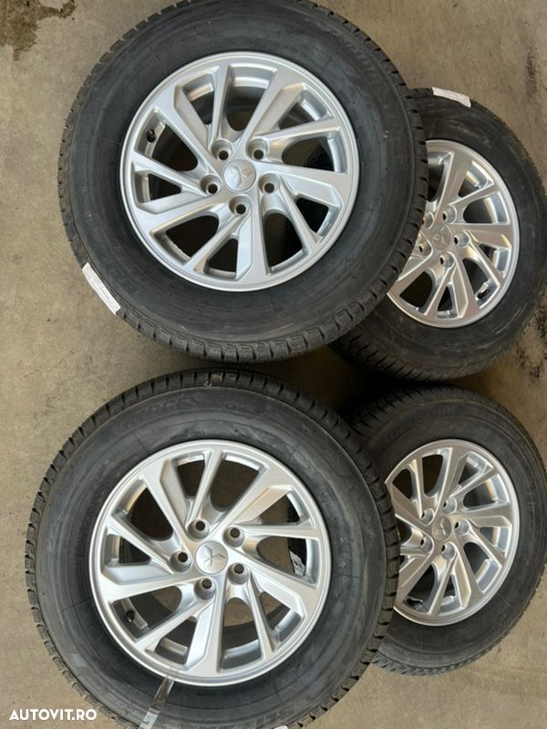 vând jante noi originale Mitsubishi Eclipse cu anvelope de iarnă - 1