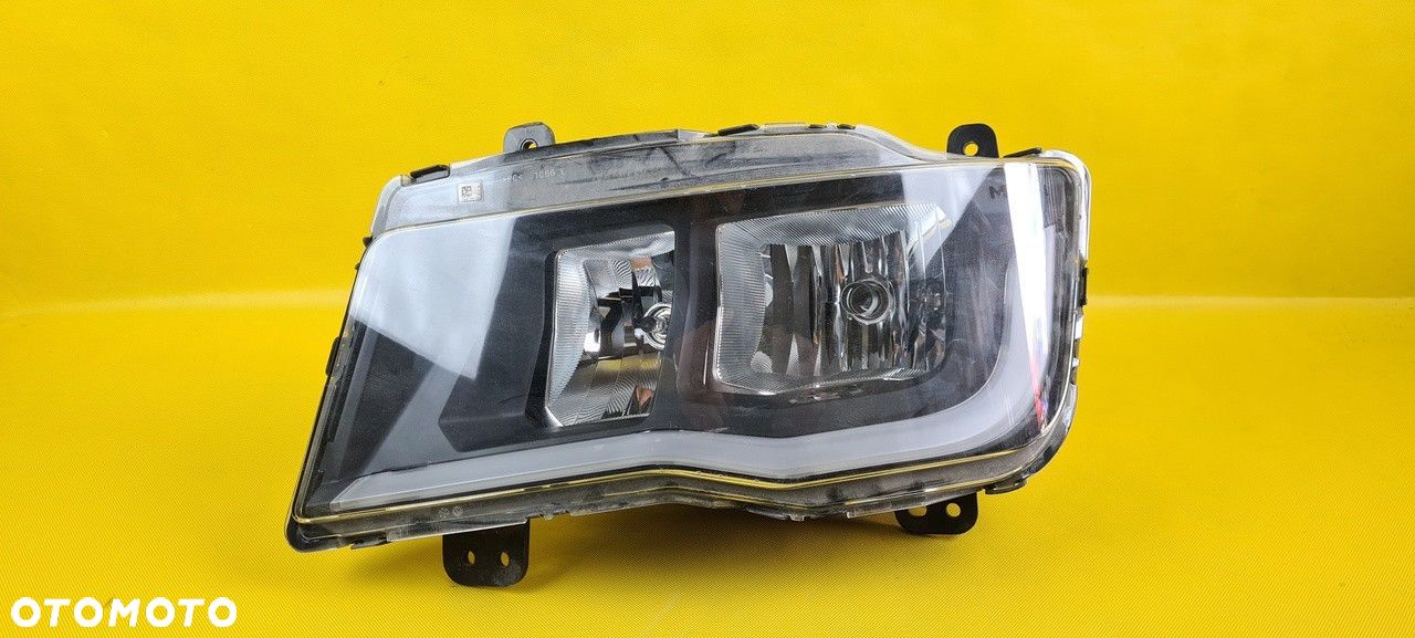 LAMPA REFLEKTOROWA H7 LEWA MAN LION 4 CITY 36.25101-6039 - 1