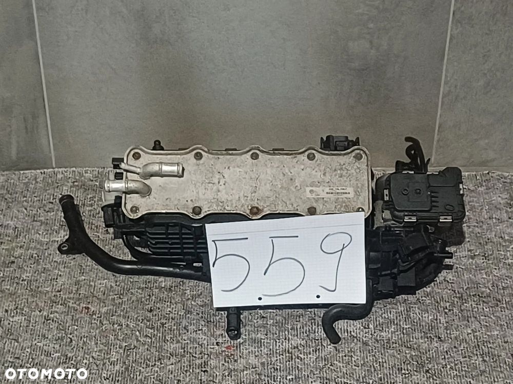 NR 559 Kolektor ssący VW GOLF 1,4 TSI 150PS 04E145749F - 1