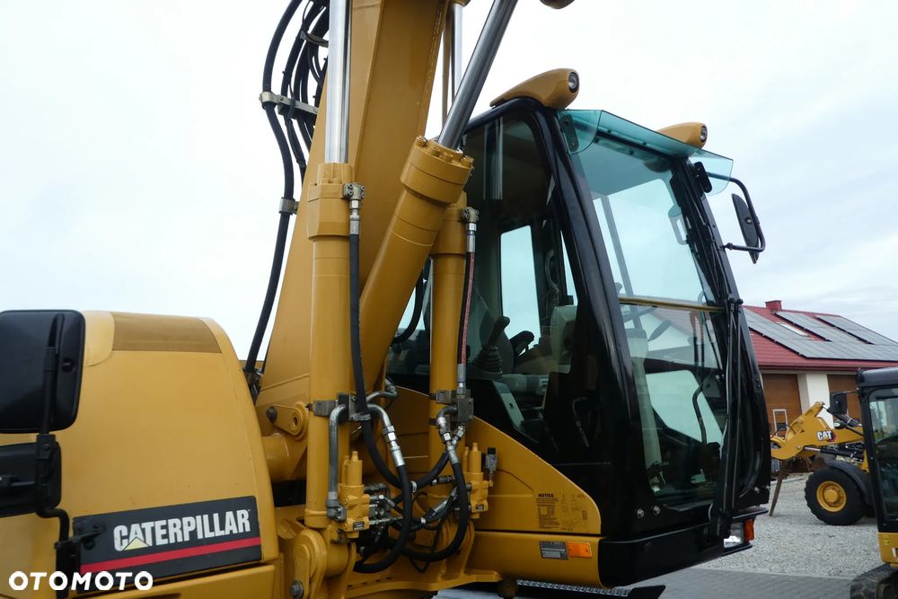 Caterpillar M315C Z NIEMIEC TRZY ŁYZKI - 16