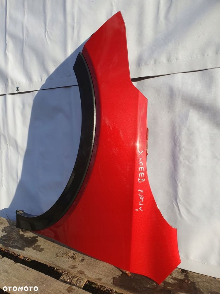 KIA X CEED XCEED BŁOTNIK LEWY PRZOD Z SIERPEM - 2