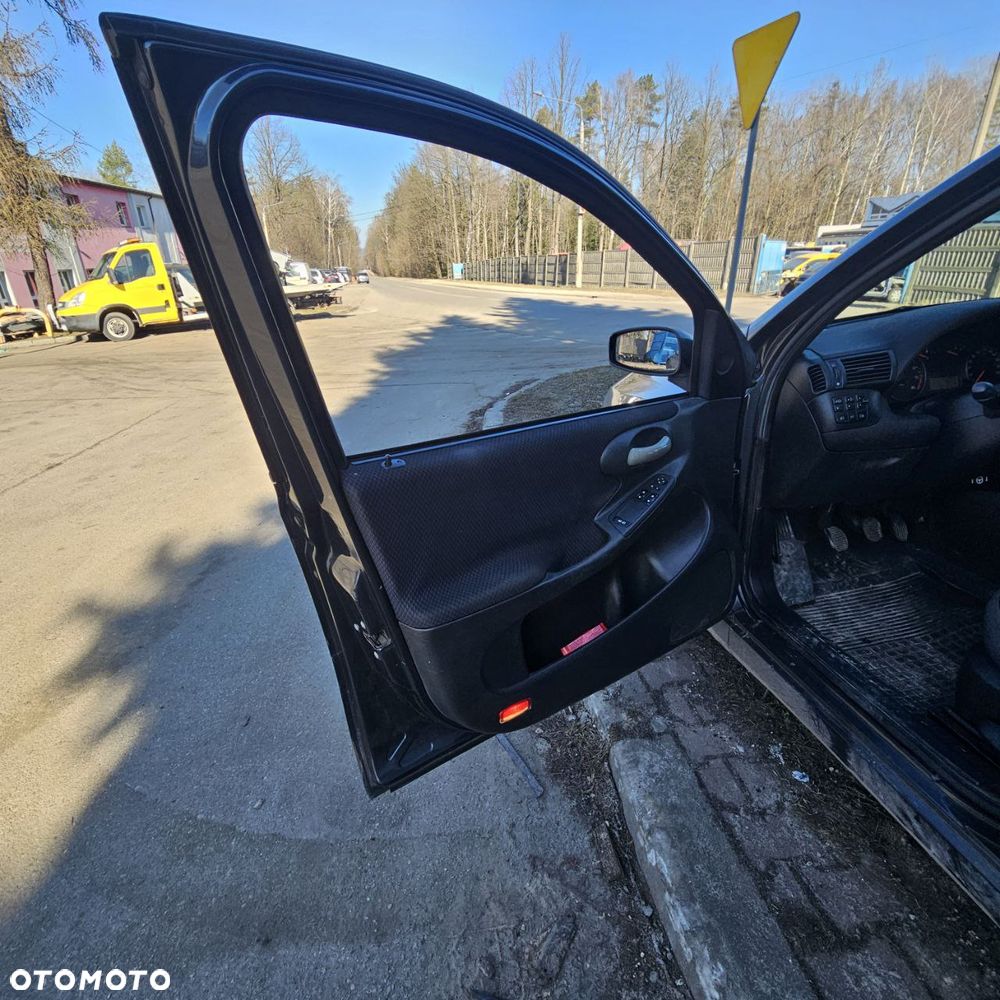 Fiat Stilo 1,6 B 76 kW / 103 KM (2003 kombi) (kod lak: 675) pojazd na części: maska, zderzak, drzwi, szyby, lusterka, chłodnica ... - 15