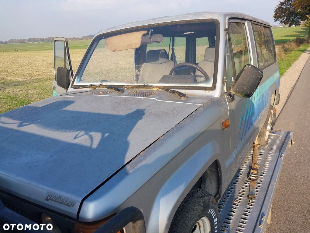 Isuzu trooper I 2.3 benzyna na części silnik skrzynia drzwi most - 5