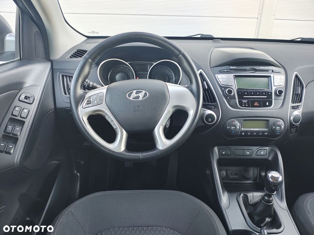 Hyundai ix35 blue 1.6 2WD Finale Gold - 13