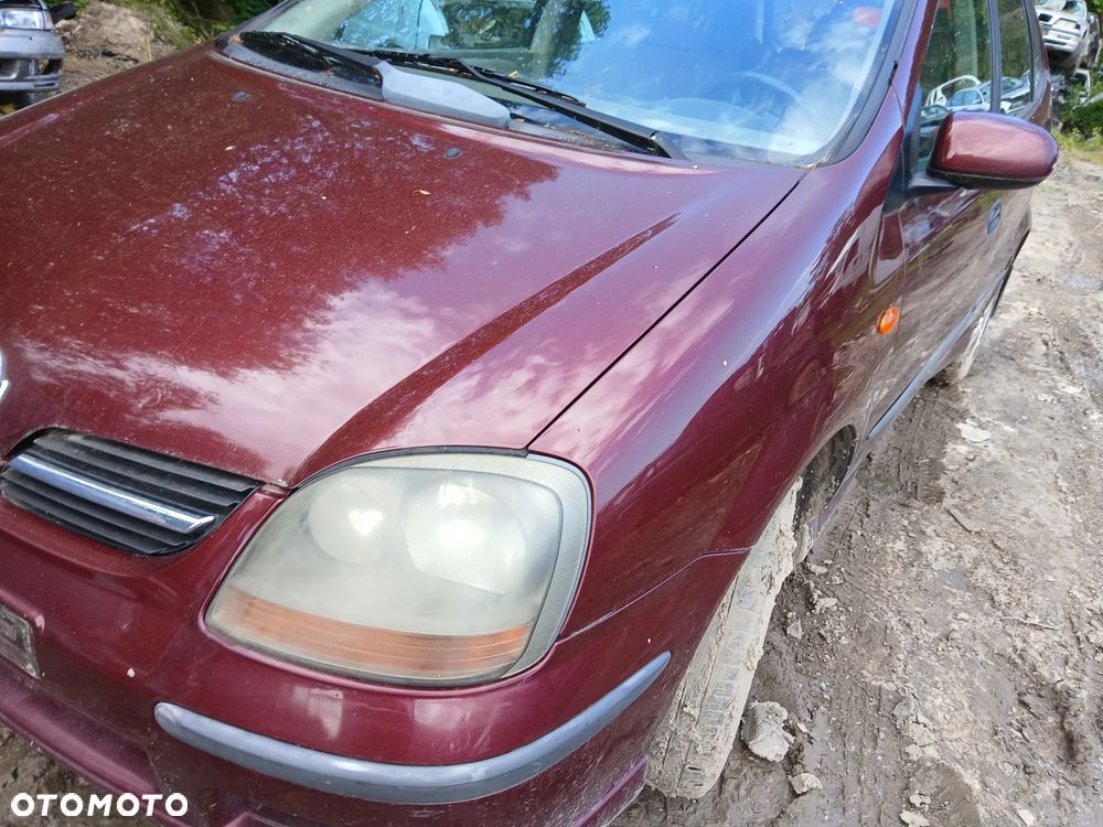 nissan almera tino X fotel fotele kanapa deska kokpit podsufitka boczek boczki klamka podłokietnik