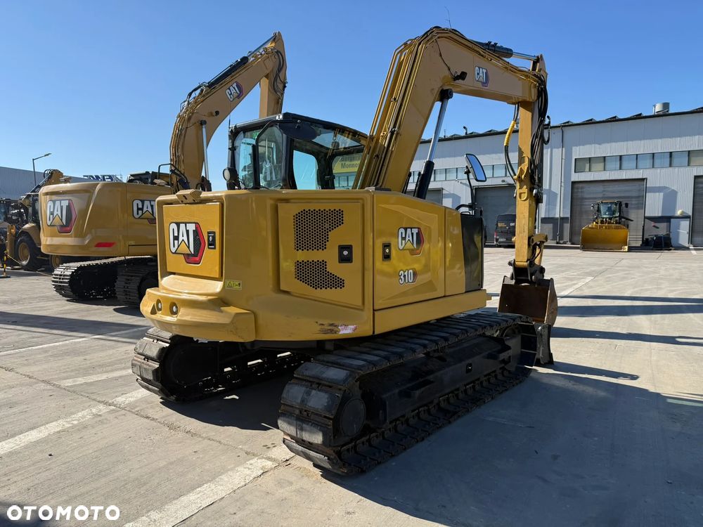 Caterpillar 310 - 4