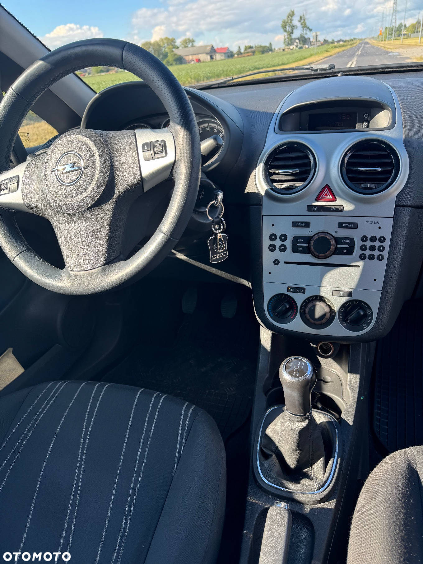 Opel Corsa 1.2 16V Cosmo - 11