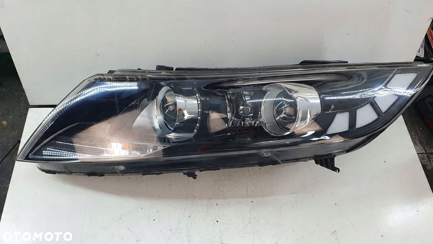 KIA Optima 3 III 10- lewa lampa przednia przód reflektor € - 6