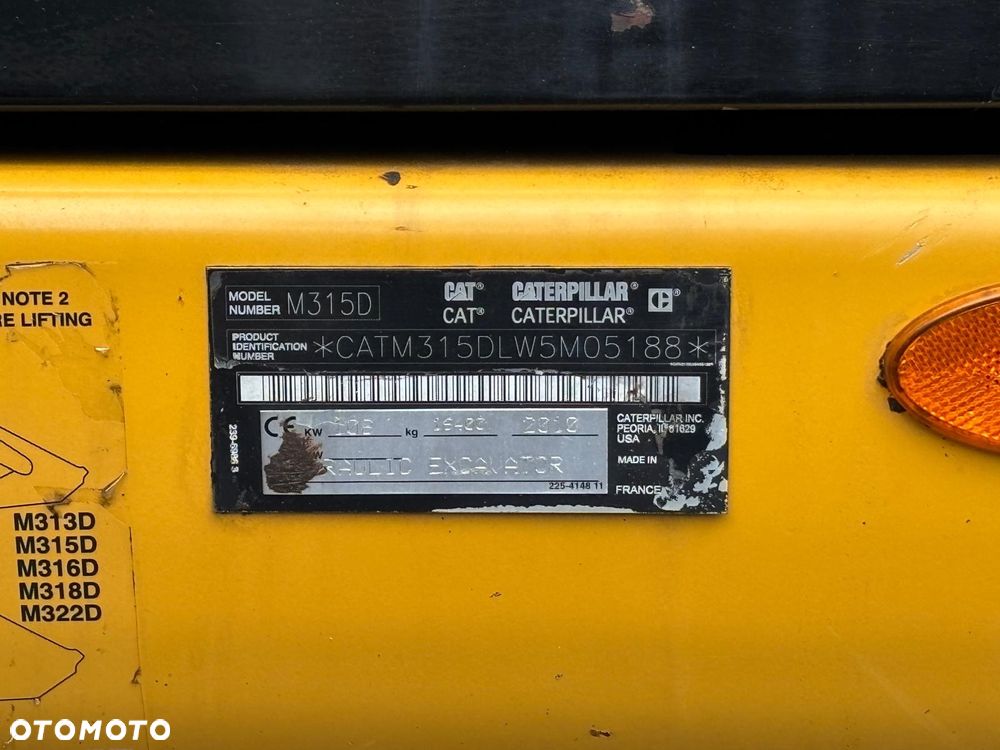 Caterpillar M315D rok 2010r podpory, chwytak obrotowy - 11