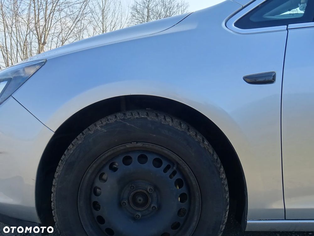 OPEL ASTRA J NADKOLE BŁOTNIK PRAWY LEWY PRZÓD PRZEDNI Z 176 - 12