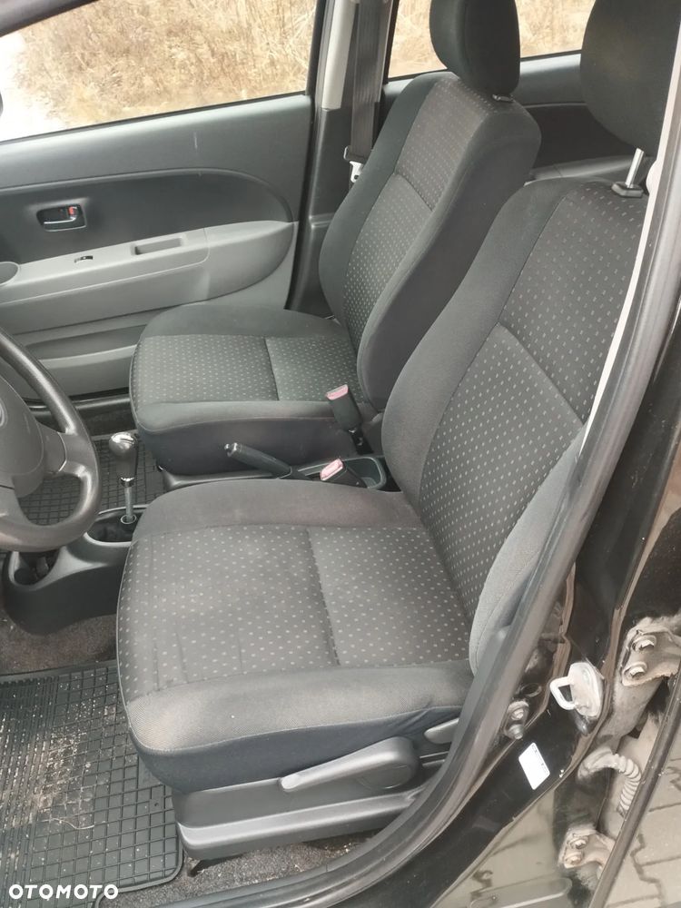 Daihatsu Sirion 1.0 - 7