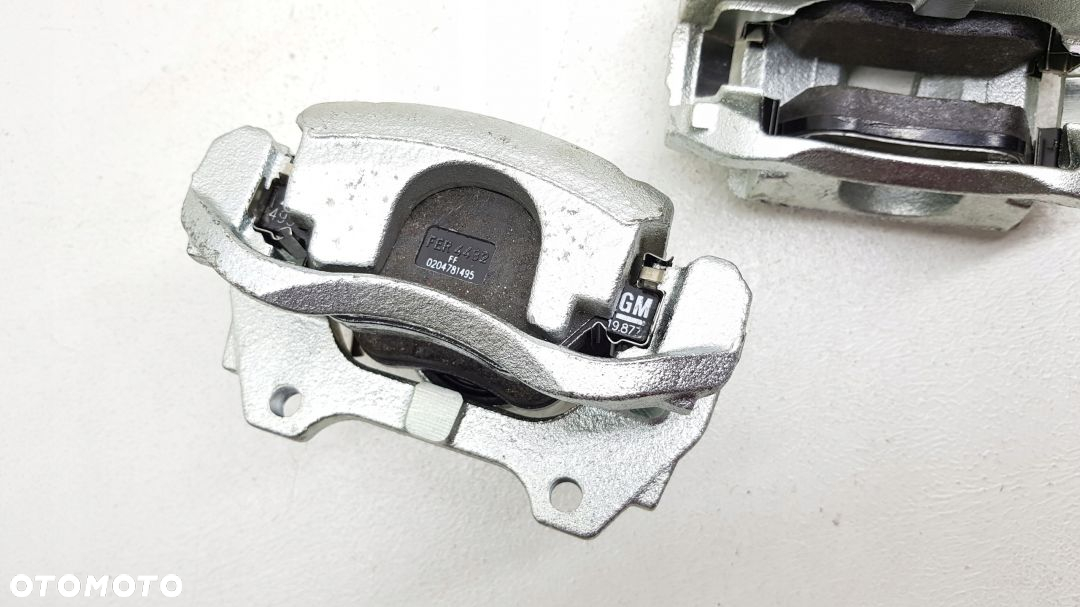 Zacisk hamulcowy Lewy przedni Opel Corsa D / Adam - 3