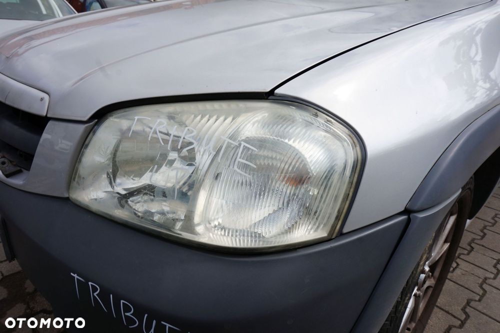 LAMPA PRZEDNIA LEWA TRIBUTE I EP EC3451040J MAZDA 2000-2008 - 1