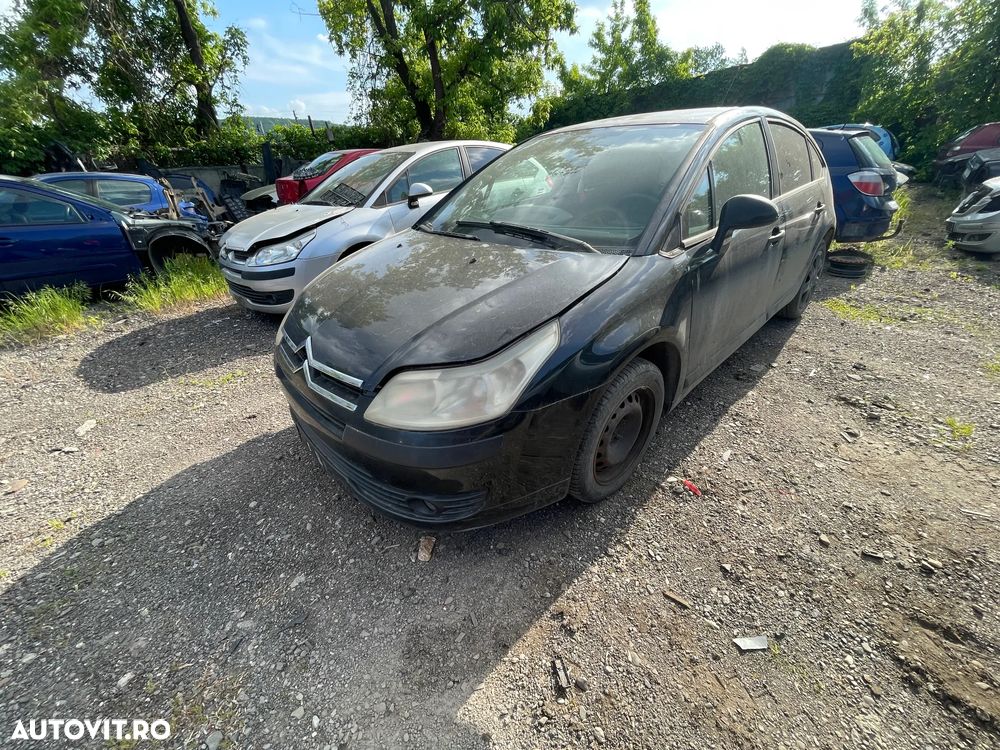 Dezmembrez Citroen C4 I Hatchback 1.4i 16v 65kW 88Cp negru an 2005 - 1