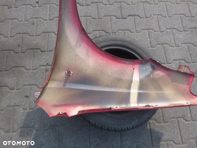 BŁOTNIK PRAWY PRZÓD PRAWY PRZEDNI CHEVROLET AVEO I T200 03-08 - 12