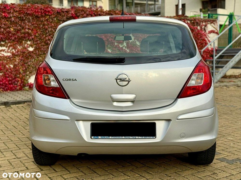 Opel Corsa 1.2 16V Enjoy - 11