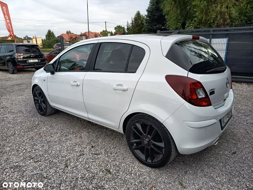 Opel Corsa 1.4 16V Active - 4