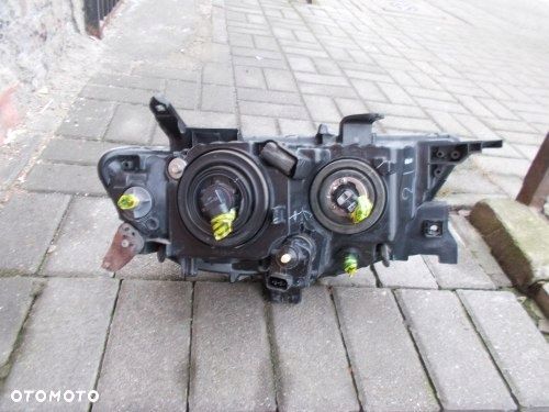 MITSUBISHI PAJERO SPORT L200 SOCZEWKA H7 LEWA PRZEDNIA LAMPA ORYGINAŁ - 9