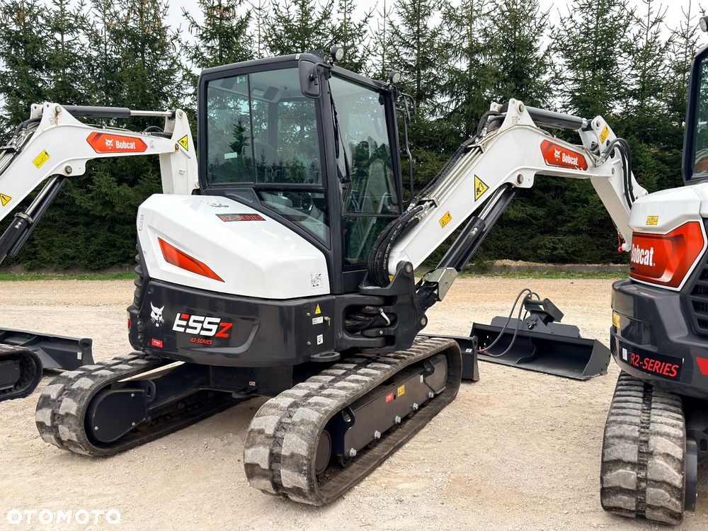 Bobcat Minikoparka Bobcat e 55Z 5ton  50 e60 Cat 303.5 304  305 3xłyżki Ramię LOONG dodatkowe linie hydr wyjścia AUX1 + 2 przeciw waga MAX-dociążenie gąsienice 85% od nowości 1 właściciel z Niemiec Auto IDLEE po serwisie Widły wiertnica grabie i inne za dopłatą Szybkozłącze hydr Miller łyżka przedsiębierna Pług  Kubota Takeuchi Jcb