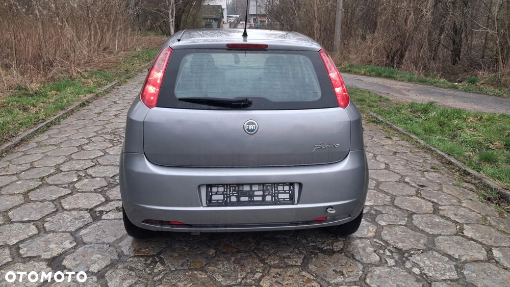 Na części Fiat Grande Punto (199) silnik 1.3 MJTD 16V 90 KM 199A3000 MultiJet lakier 595/A skrzynia maska drzwi klapa szyba fotel kanapa lusterko lampa deska GWARANCJA !!! Przód Tył Zestaw Komplet Drzwi Klapa Zderzak Błotnik Maska Grill Atrapa Szyba Pas Lampa Lusterko Boczki Fotel Kanapa Kokpit Deska Rozdzielcza Przełącznik Włącznik Sterownik Przewody Wiązka Instalacja Moduł Komputer Czujnik Listwa Pompa Alternator Wtryski Głowica Rozrusznik Kompresor Sprzęgło Dwumas Silnik  Skrzynia ABS Klimatyzacji Paliwa Wspomagania Kolektor Turbina Przepustnica Zawór Chłodnica Koło Hak Belka Sanki Zawieszenie Mcpherson Półoś Amortyzator Wydech Tłumik Zacisk Most - 7