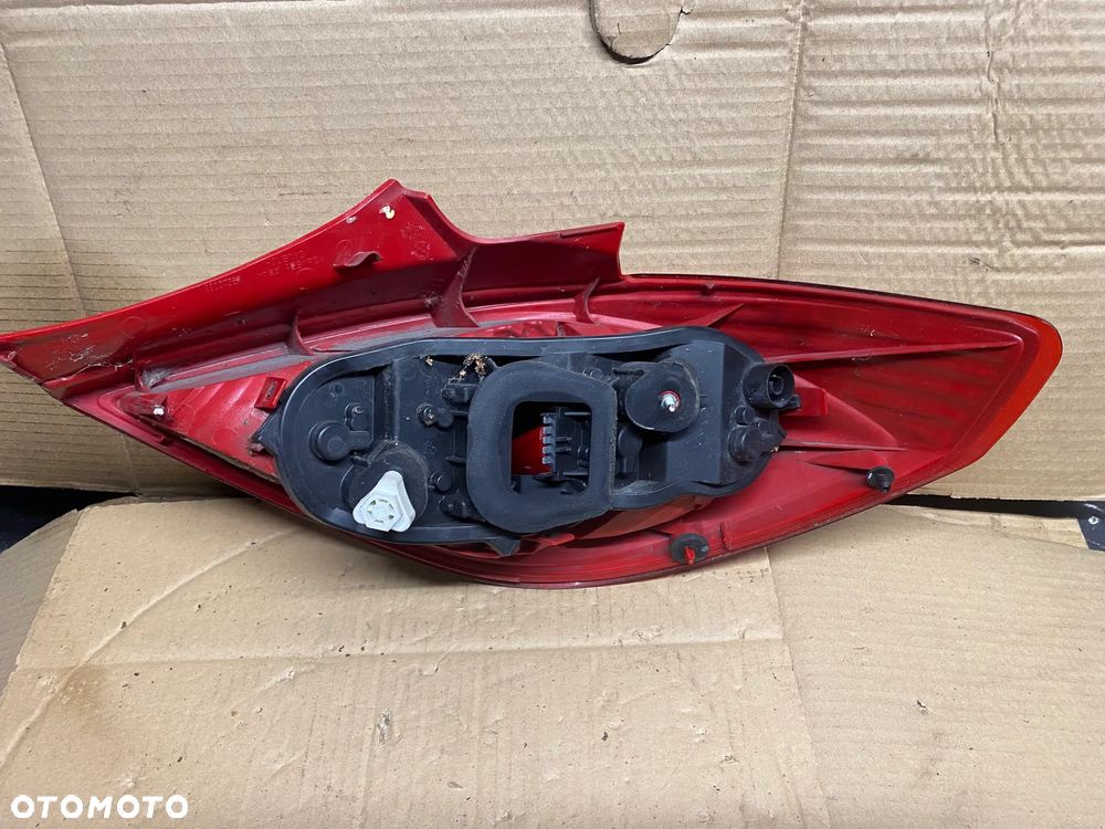 LAMPA TYLNA LEWA OPEL CORSA D 13186350 - 4