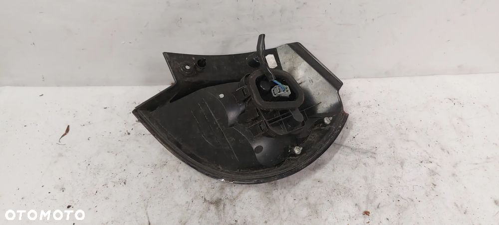 .  LAMPA TYL TYLNA LEWA MITSUBISHI COLT 6 Z30 3D - 3