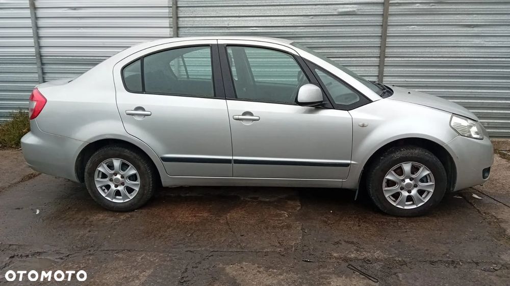 TYLKO CZĘŚCI Suzuki SX4 I 1.6 VVT 16V M16A 79kW 107KM SEDAN 06-09 lakier z2s - 2