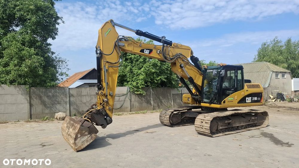 Caterpillar 319DL - 1