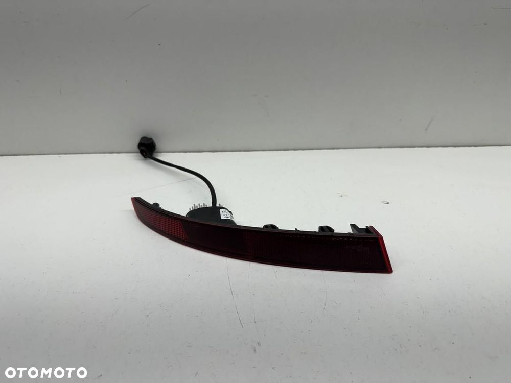 Lewy odblask tył Skoda Kamiq 658945701