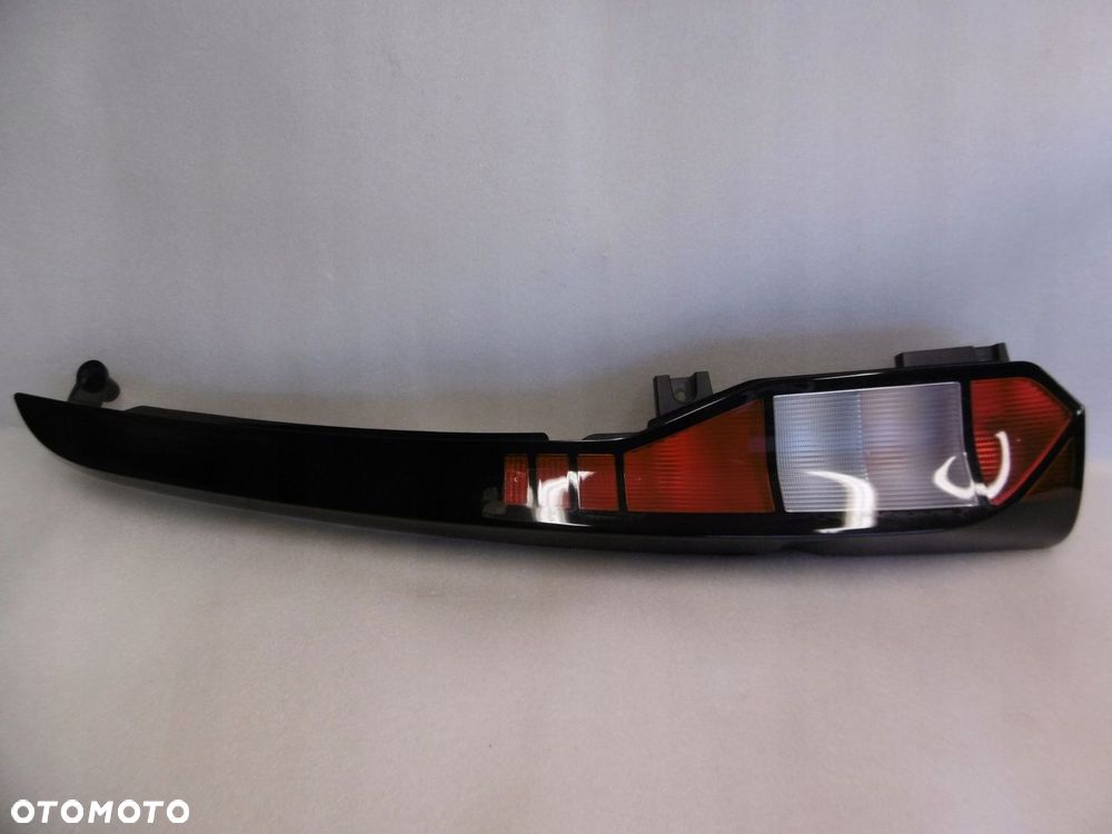 VW CADDY 2K7 20r - lampa tylna lewa - 1