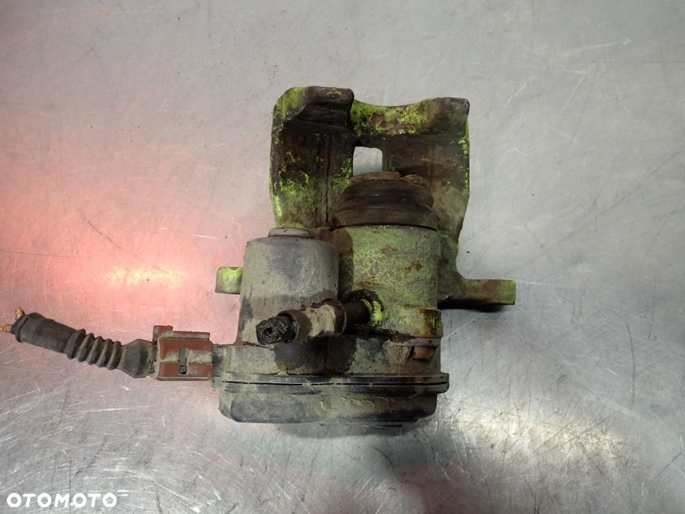 ZACISK HAMULCA PRAWY TYŁ AUDI A4 B8 - 4