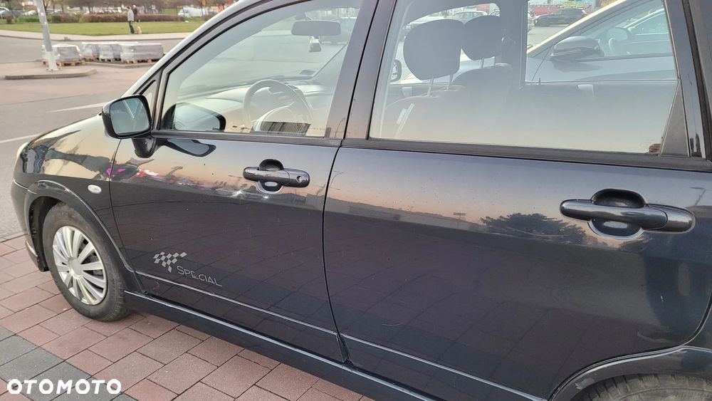 Suzuki Liana 1.6 - 7