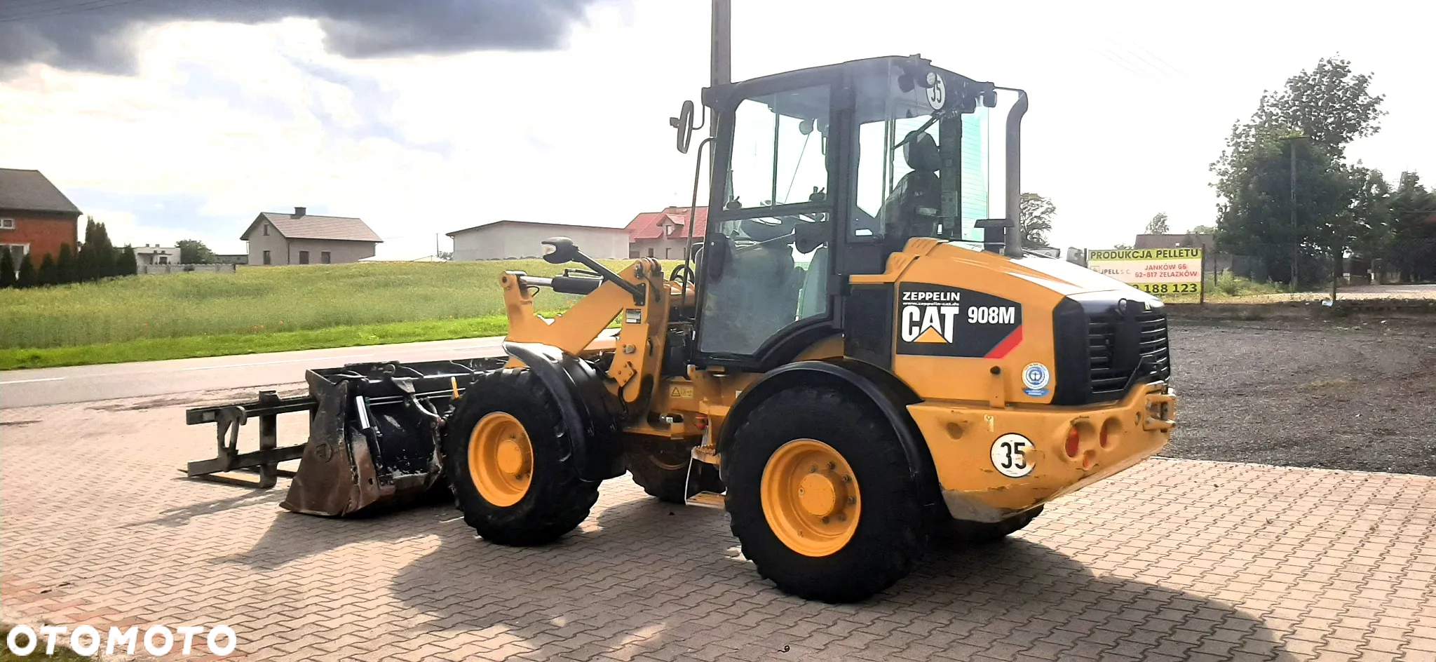 Caterpillar 908M - 2