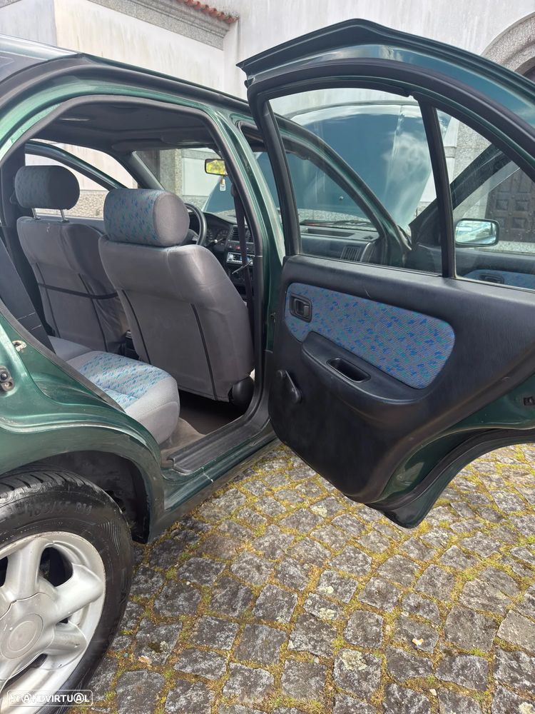 Nissan Almera ver-1-4-sr - 9