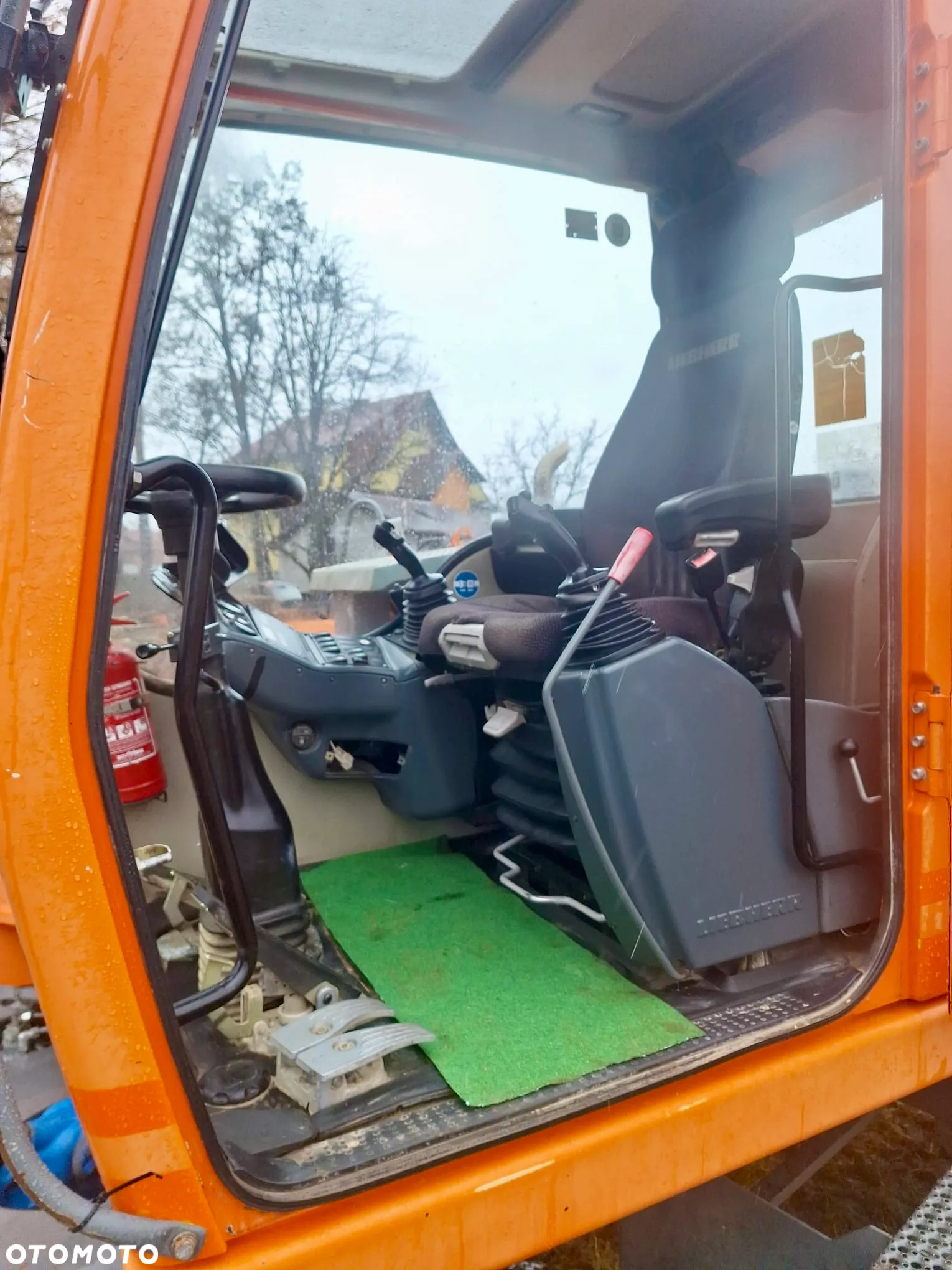 Liebherr A910 - 15