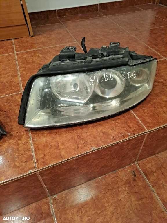 Far stanga dreapta Audi A4 B6 originale - 2