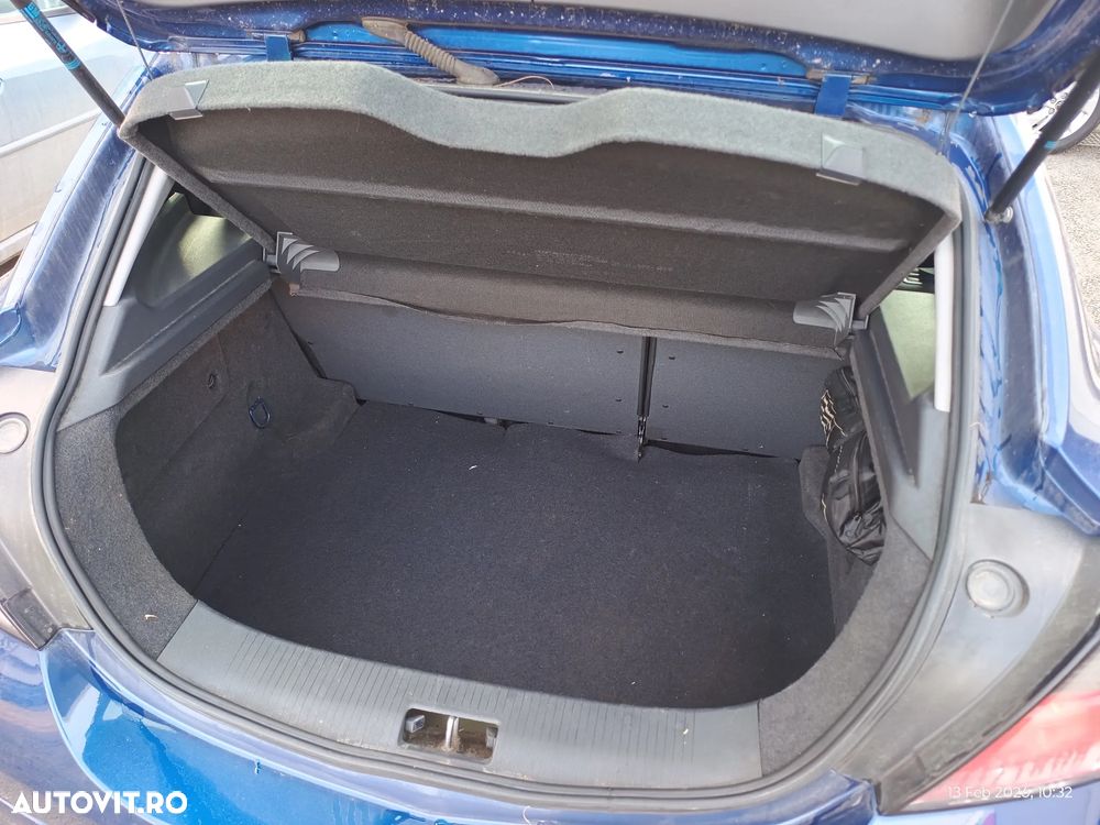 Opel Astra 1.4i Cosmo - 11