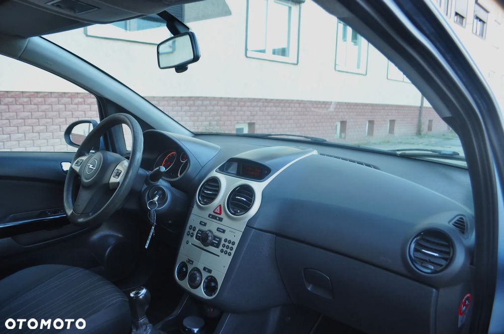 Opel Corsa 1.2 16V Enjoy - 23