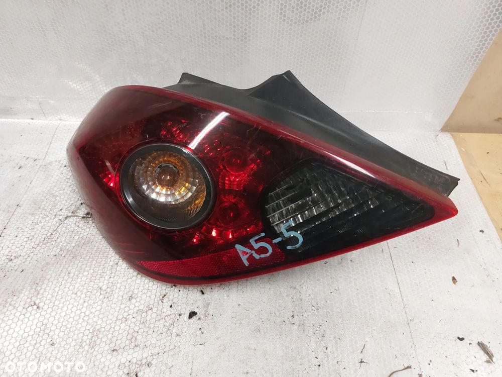 .  LAMPA TYL TYLNA LEWA OPEL CORSA D !3D ! ! CIEMNA ! - 1
