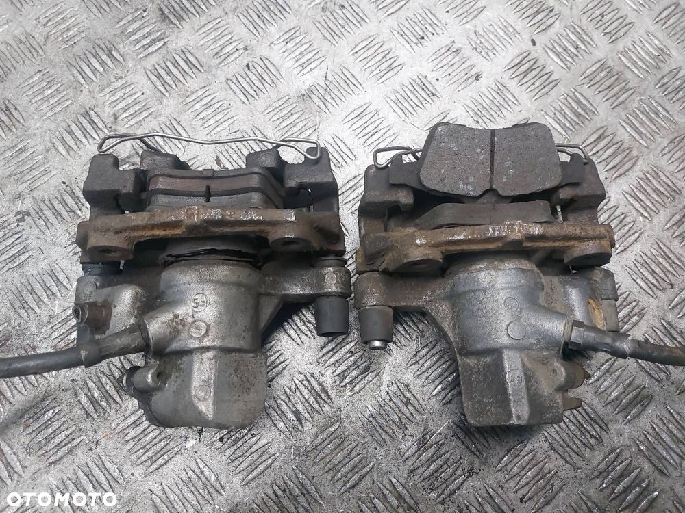 TARCZE HAMULCOWE PRZÓD TYŁ + ZACISK PRZÓD TYŁ FORD FOCUS MK2 1.6 TDCI - 16