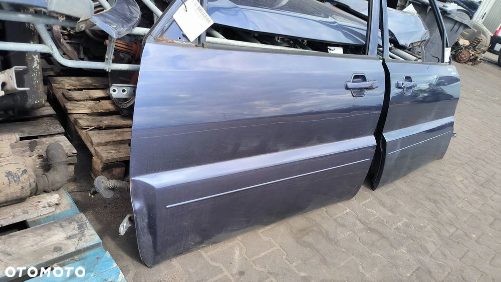 Drzwi przednie lewe/prawe Mitsubishi Pajero 2008 SUV (3-drzwiowy) - 1
