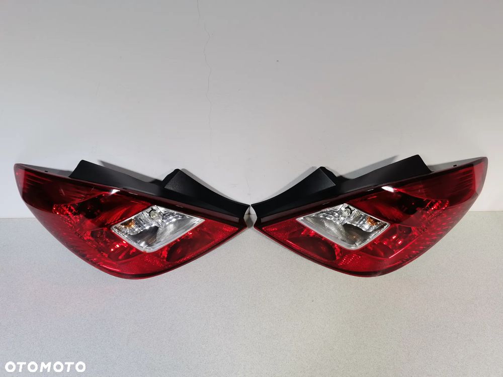 Lampa Tył LEWA i PRAWA OPEL CORSA D 5D H/B 06-15 Oryginał EUR - 2