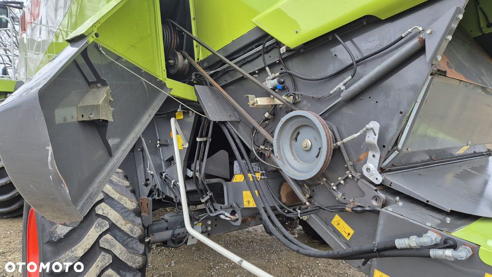 Claas Lexion 600 z hederem - 17