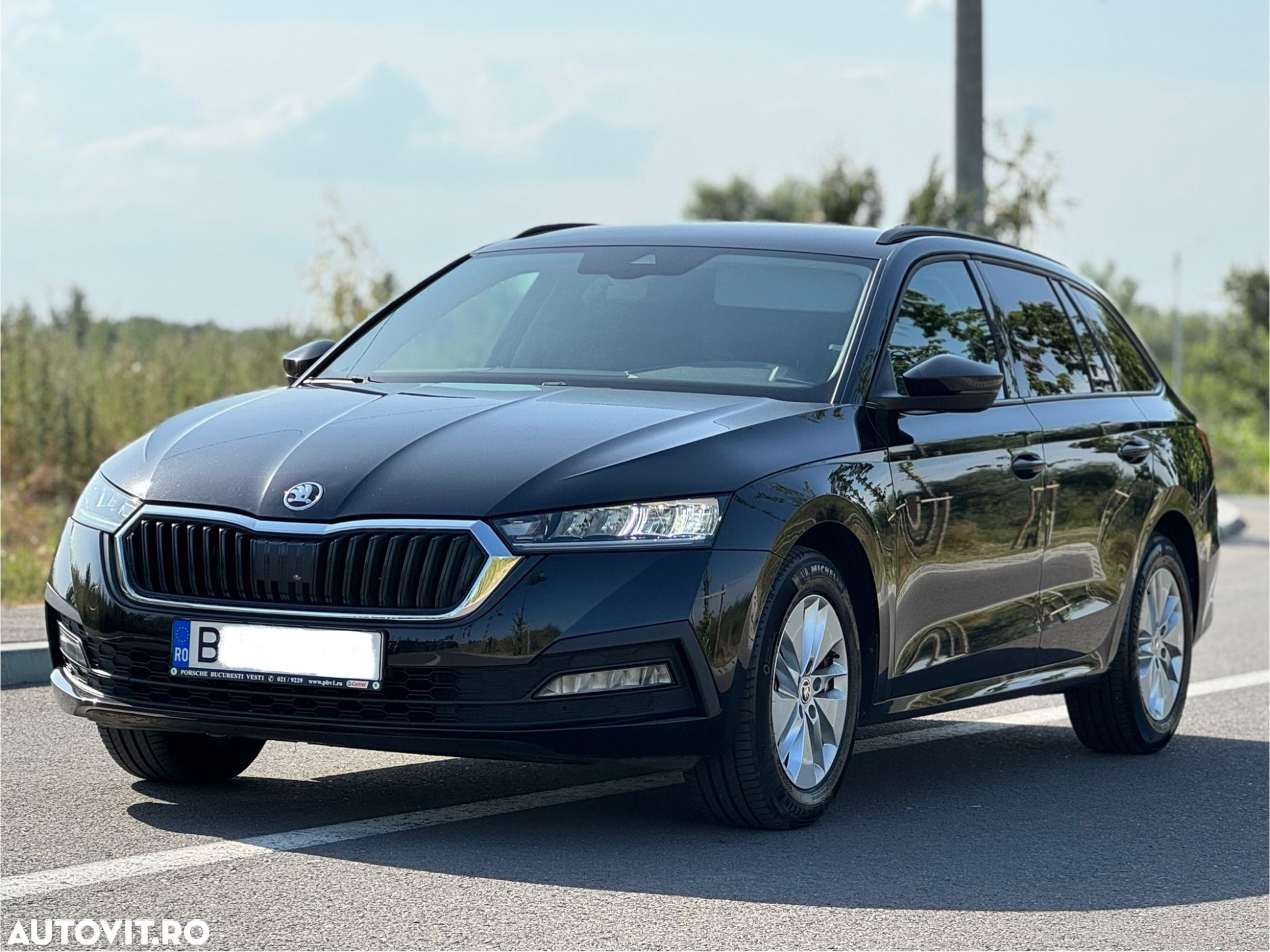 Skoda Octavia Combi 2.0 TDI DSG Ambition - 1