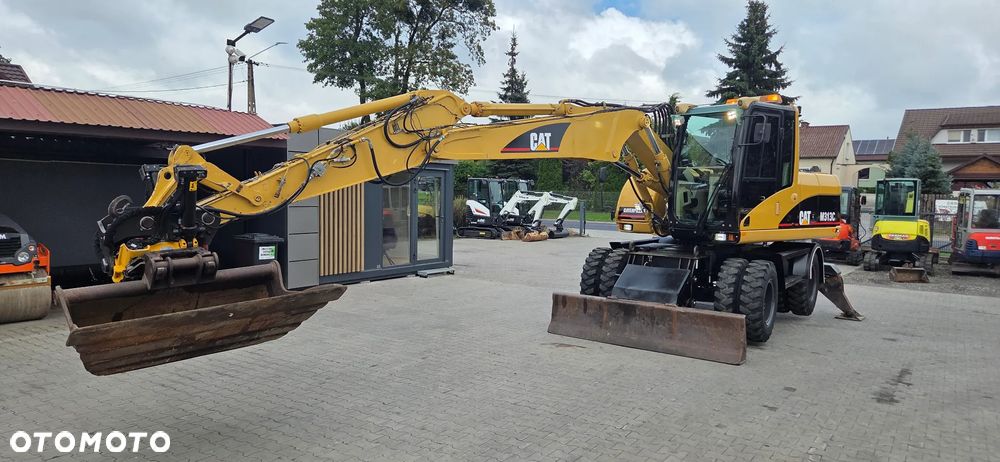 Caterpillar <<CAT M313C, Rotatilt Engcon z 2017r szczypce, szybka skrzynia, centralne smarowanie,TOP!!>> - 39