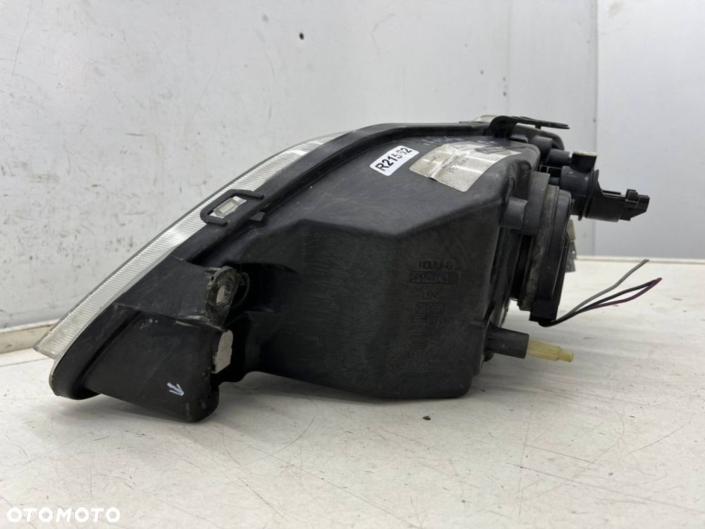 Lampa reflektor Dacia Logan I 04-08r. PRAWA  przednia zwykła prawy przód 8200211006 - 11