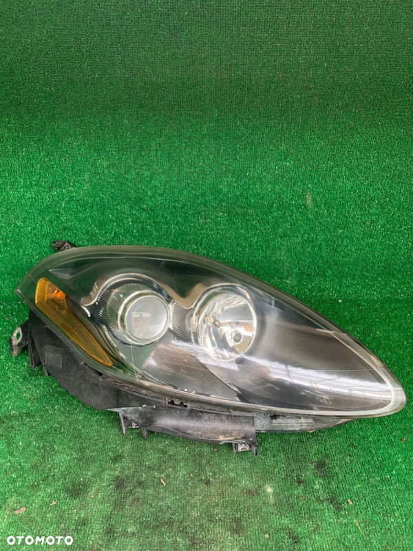 Lampa przód przednia Fiat Croma II Bravo II Lift Europa 518169800 WWA