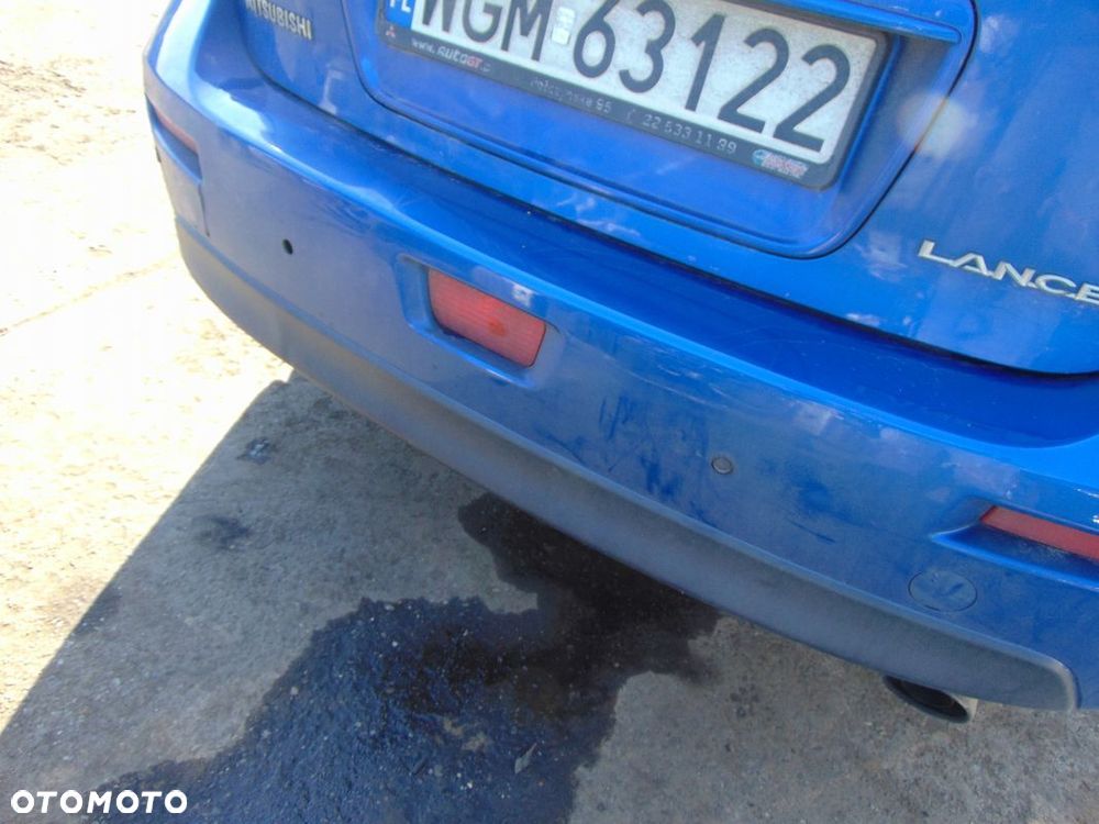 ZDERZAK TYŁ TYLNY MITSUBISHI LANCER VIII D06 - 3