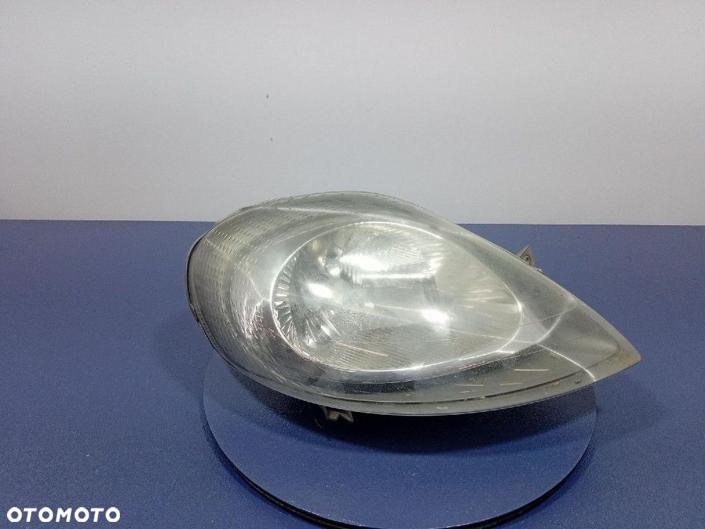 OPEL VIVARO A TRAFIC II  REFLEKTOR PRAWY PRZÓD LAMPA PRZEDNIA EU7700311372 - 1